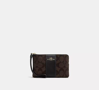 Coach Corner Zip Wristlet In Signature Canvas