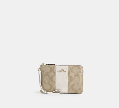 Coach Corner Zip Wristlet In Signature Canvas