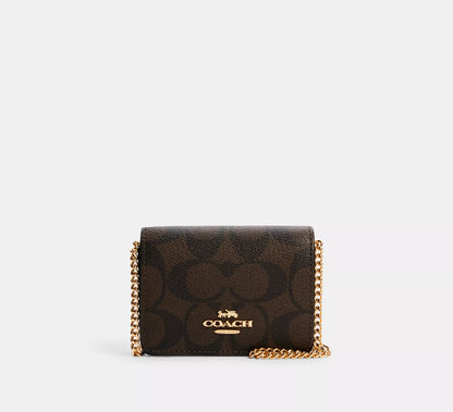 Coach Mini Wallet On A Chain In Signature Canvas