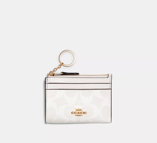 Coach Mini Skinny Id Case In Signature Canvas