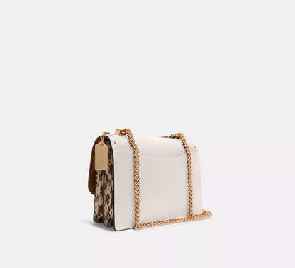 Coach Klare Crossbody Bag In Signature Canvas With Rivets